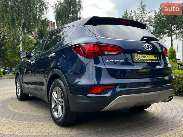 Синий Хендай Санта Фе, объемом двигателя 2.4 л и пробегом 190 тыс. км за 16300 $, фото 4 на Automoto.ua