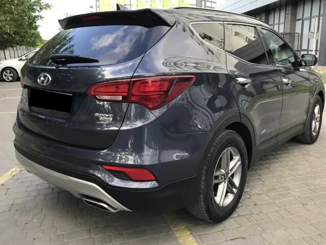 Синий Хендай Санта Фе, объемом двигателя 2.4 л и пробегом 70 тыс. км за 13300 $, фото 4 на Automoto.ua