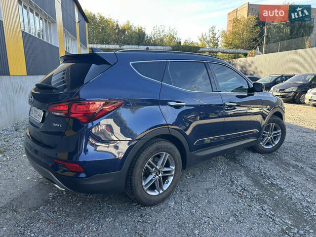 Синий Хендай Санта Фе, объемом двигателя 2.36 л и пробегом 122 тыс. км за 14999 $, фото 16 на Automoto.ua