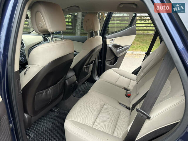 Синий Хендай Санта Фе, объемом двигателя 2.4 л и пробегом 86 тыс. км за 15500 $, фото 12 на Automoto.ua