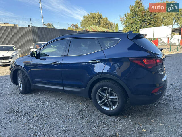 Синий Хендай Санта Фе, объемом двигателя 2.36 л и пробегом 122 тыс. км за 14999 $, фото 9 на Automoto.ua