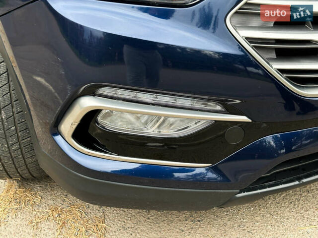 Синий Хендай Санта Фе, объемом двигателя 2.4 л и пробегом 86 тыс. км за 15500 $, фото 42 на Automoto.ua