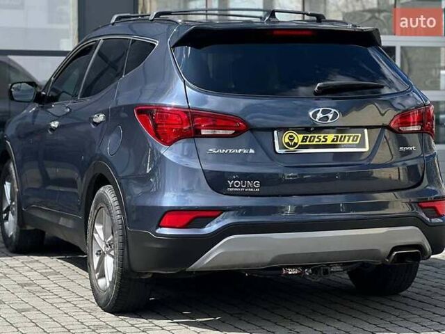 Синий Хендай Санта Фе, объемом двигателя 2.36 л и пробегом 115 тыс. км за 16100 $, фото 3 на Automoto.ua
