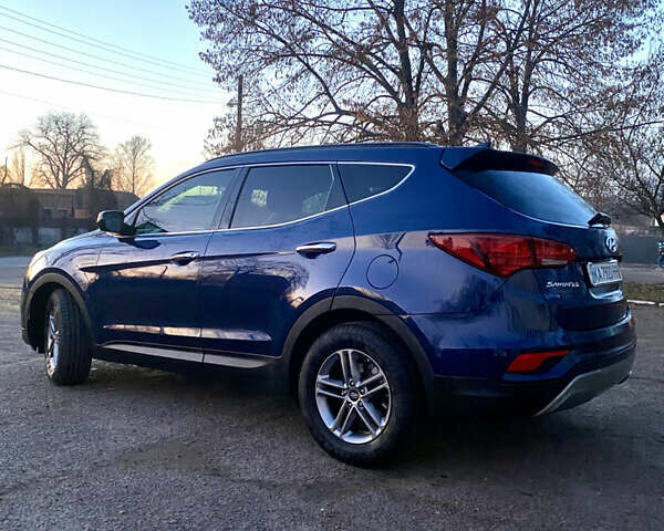 Синий Хендай Санта Фе, объемом двигателя 2.36 л и пробегом 122 тыс. км за 14000 $, фото 9 на Automoto.ua