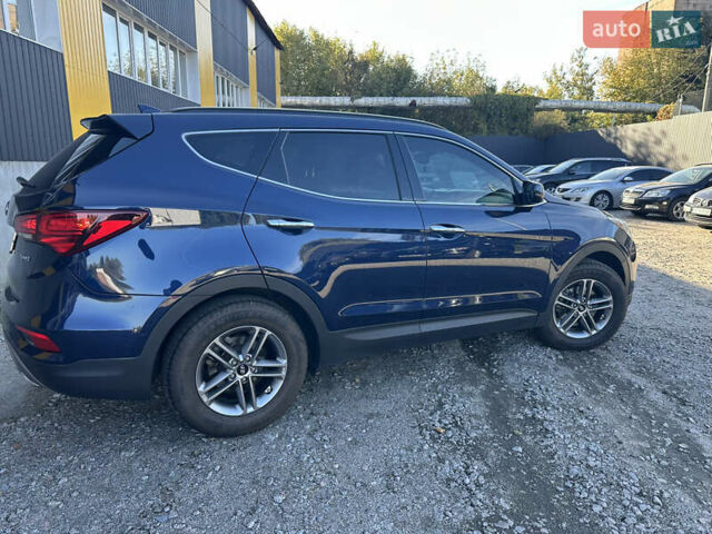 Синий Хендай Санта Фе, объемом двигателя 2.36 л и пробегом 122 тыс. км за 14999 $, фото 18 на Automoto.ua