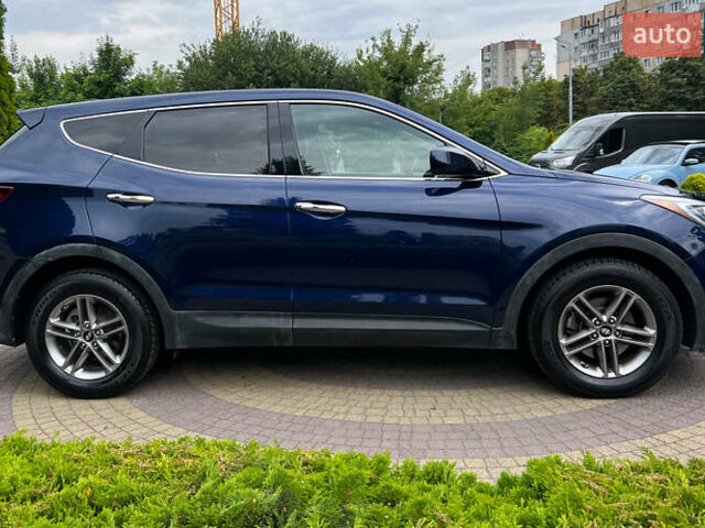 Синий Хендай Санта Фе, объемом двигателя 2.4 л и пробегом 190 тыс. км за 16300 $, фото 7 на Automoto.ua