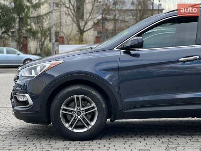 Синий Хендай Санта Фе, объемом двигателя 2.36 л и пробегом 115 тыс. км за 16100 $, фото 7 на Automoto.ua