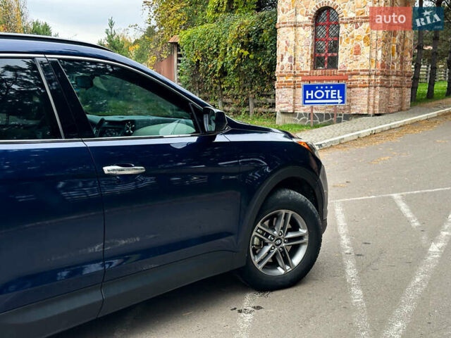 Синий Хендай Санта Фе, объемом двигателя 2.4 л и пробегом 86 тыс. км за 15500 $, фото 53 на Automoto.ua