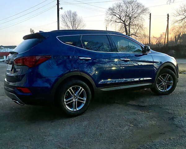 Синий Хендай Санта Фе, объемом двигателя 2.36 л и пробегом 122 тыс. км за 14000 $, фото 6 на Automoto.ua