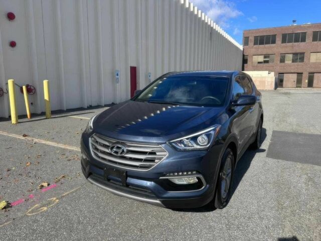 Синий Хендай Санта Фе, объемом двигателя 2.4 л и пробегом 53 тыс. км за 8500 $, фото 2 на Automoto.ua