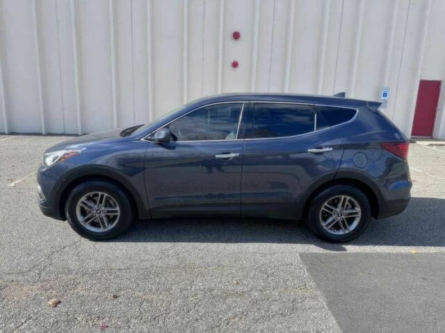 Синий Хендай Санта Фе, объемом двигателя 2.4 л и пробегом 61 тыс. км за 9100 $, фото 2 на Automoto.ua