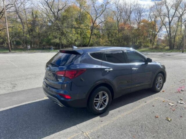 Синий Хендай Санта Фе, объемом двигателя 2.4 л и пробегом 53 тыс. км за 8500 $, фото 6 на Automoto.ua