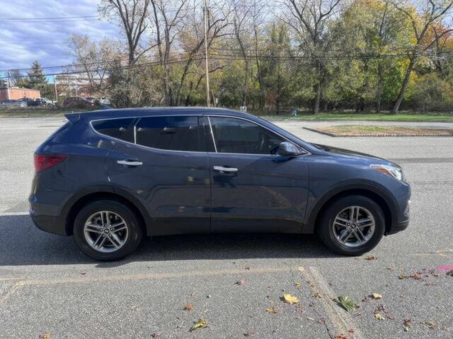 Синий Хендай Санта Фе, объемом двигателя 2.4 л и пробегом 61 тыс. км за 9100 $, фото 3 на Automoto.ua