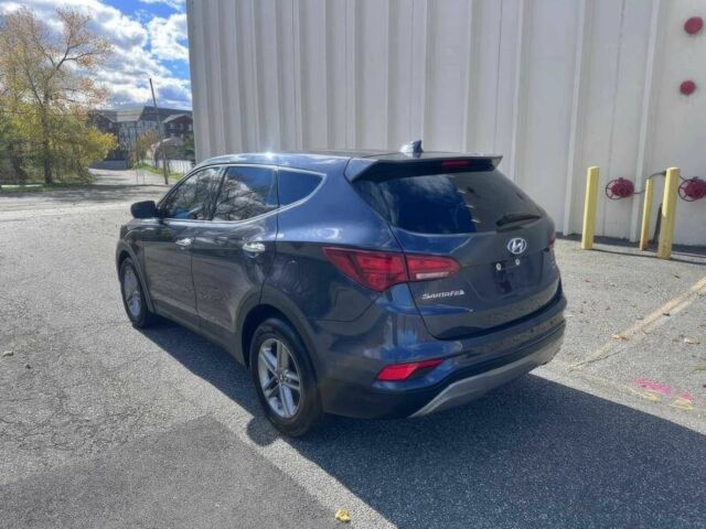 Синий Хендай Санта Фе, объемом двигателя 2.4 л и пробегом 61 тыс. км за 9100 $, фото 6 на Automoto.ua