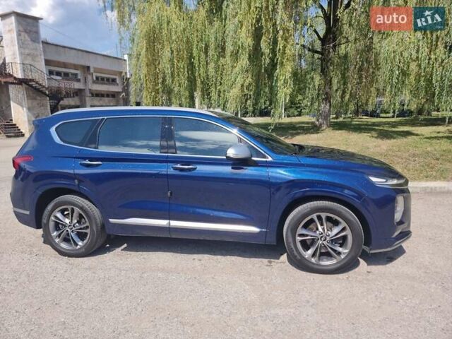 Синий Хендай Санта Фе, объемом двигателя 2 л и пробегом 119 тыс. км за 28900 $, фото 4 на Automoto.ua