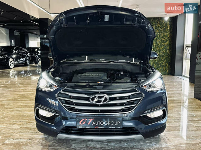 Синій Хендай Санта Фе, об'ємом двигуна 2 л та пробігом 181 тис. км за 20500 $, фото 50 на Automoto.ua