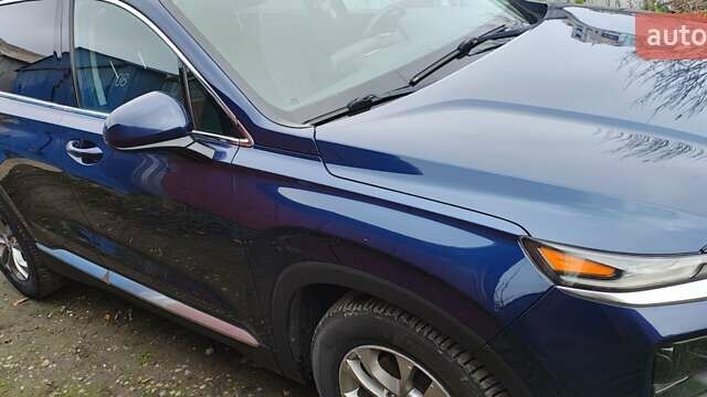 Синий Хендай Санта Фе, объемом двигателя 2.36 л и пробегом 80 тыс. км за 21300 $, фото 10 на Automoto.ua