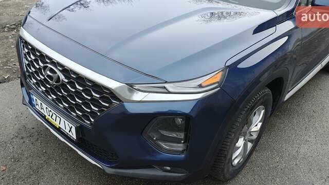 Синий Хендай Санта Фе, объемом двигателя 2.36 л и пробегом 80 тыс. км за 21300 $, фото 8 на Automoto.ua