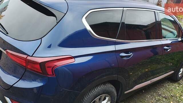Синий Хендай Санта Фе, объемом двигателя 2.36 л и пробегом 80 тыс. км за 21300 $, фото 13 на Automoto.ua