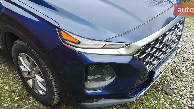 Синий Хендай Санта Фе, объемом двигателя 2.36 л и пробегом 80 тыс. км за 21300 $, фото 9 на Automoto.ua
