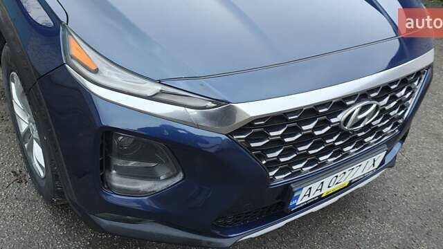 Синий Хендай Санта Фе, объемом двигателя 2.36 л и пробегом 80 тыс. км за 21300 $, фото 3 на Automoto.ua