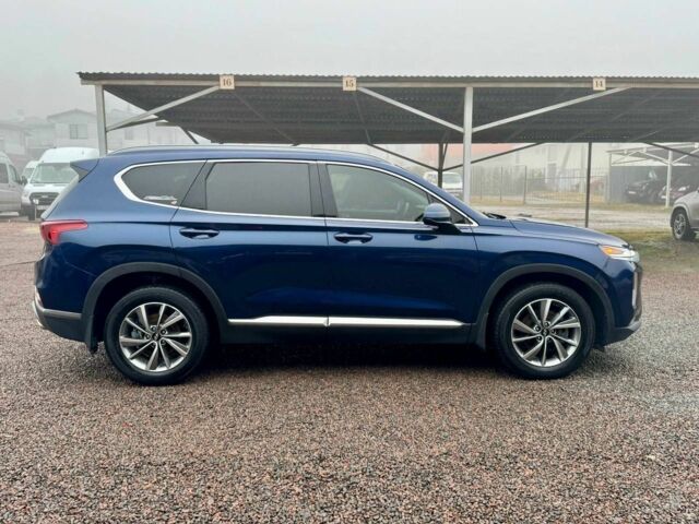 Синий Хендай Санта Фе, объемом двигателя 2.4 л и пробегом 134 тыс. км за 18300 $, фото 12 на Automoto.ua