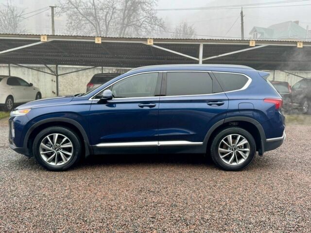 Синий Хендай Санта Фе, объемом двигателя 2.4 л и пробегом 134 тыс. км за 18300 $, фото 2 на Automoto.ua