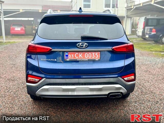 Синий Хендай Санта Фе, объемом двигателя 2.4 л и пробегом 134 тыс. км за 18300 $, фото 7 на Automoto.ua