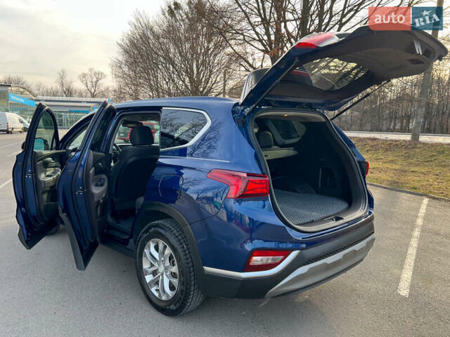 Синий Хендай Санта Фе, объемом двигателя 2.36 л и пробегом 74 тыс. км за 20900 $, фото 20 на Automoto.ua