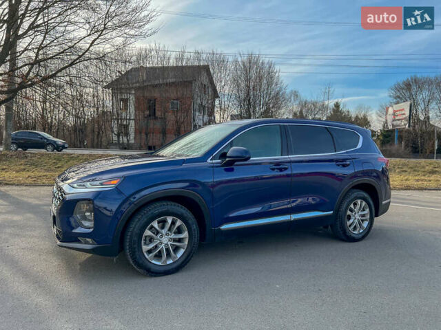 Синий Хендай Санта Фе, объемом двигателя 2.36 л и пробегом 74 тыс. км за 20900 $, фото 5 на Automoto.ua