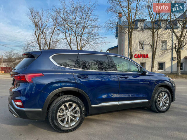 Синий Хендай Санта Фе, объемом двигателя 2.36 л и пробегом 74 тыс. км за 20900 $, фото 11 на Automoto.ua