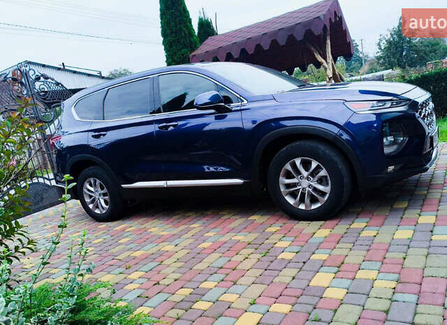 Синий Хендай Санта Фе, объемом двигателя 2.36 л и пробегом 74 тыс. км за 20900 $, фото 3 на Automoto.ua