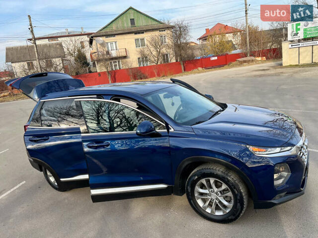 Синий Хендай Санта Фе, объемом двигателя 2.36 л и пробегом 74 тыс. км за 20900 $, фото 19 на Automoto.ua