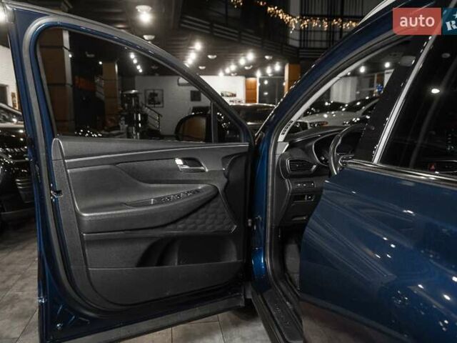 Синий Хендай Санта Фе, объемом двигателя 2.5 л и пробегом 53 тыс. км за 25900 $, фото 13 на Automoto.ua