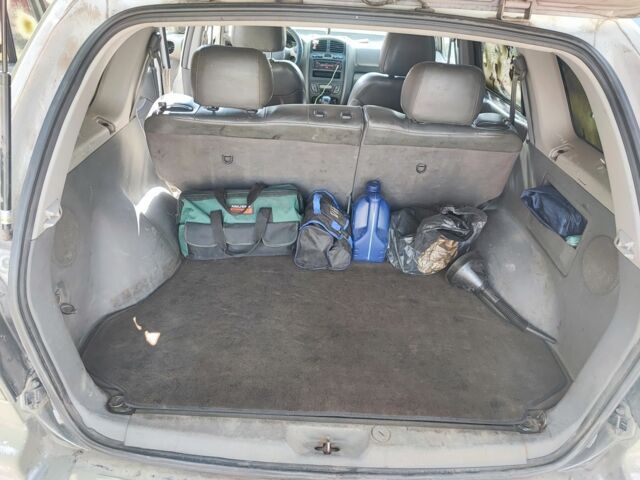 Зеленый Хендай Санта Фе, объемом двигателя 2 л и пробегом 316 тыс. км за 2404 $, фото 7 на Automoto.ua