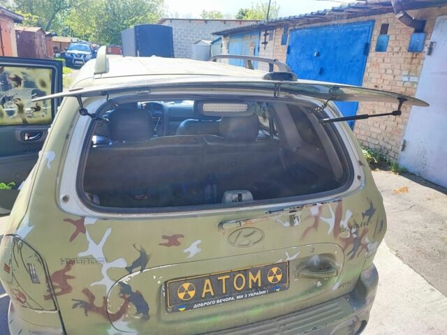 Зеленый Хендай Санта Фе, объемом двигателя 2 л и пробегом 316 тыс. км за 2404 $, фото 3 на Automoto.ua