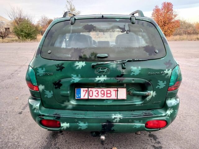 Зеленый Хендай Санта Фе, объемом двигателя 2 л и пробегом 287 тыс. км за 2750 $, фото 5 на Automoto.ua
