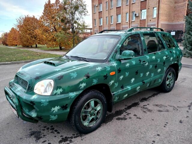 Зеленый Хендай Санта Фе, объемом двигателя 2 л и пробегом 287 тыс. км за 2750 $, фото 1 на Automoto.ua