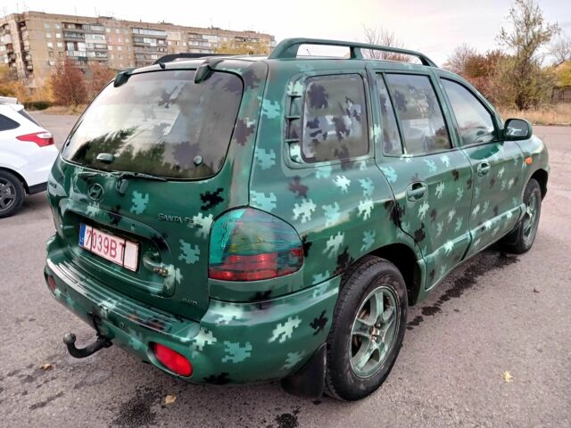 Зеленый Хендай Санта Фе, объемом двигателя 2 л и пробегом 287 тыс. км за 2750 $, фото 4 на Automoto.ua