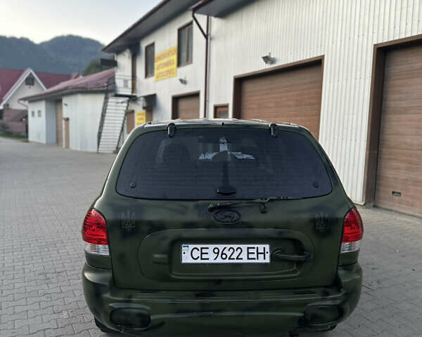 Зеленый Хендай Санта Фе, объемом двигателя 2.35 л и пробегом 223 тыс. км за 4500 $, фото 2 на Automoto.ua