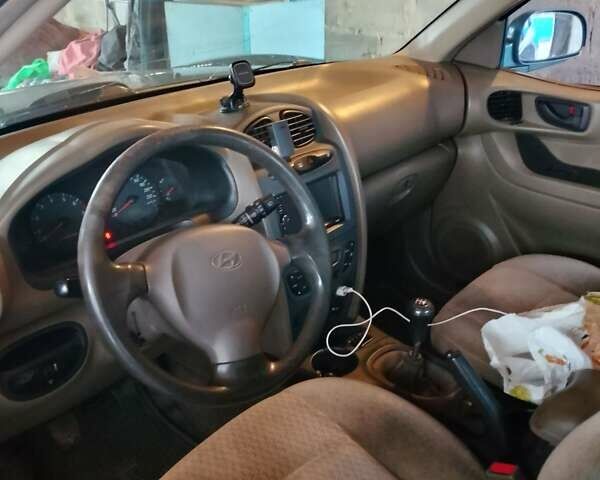 Зеленый Хендай Санта Фе, объемом двигателя 2 л и пробегом 300 тыс. км за 4200 $, фото 4 на Automoto.ua