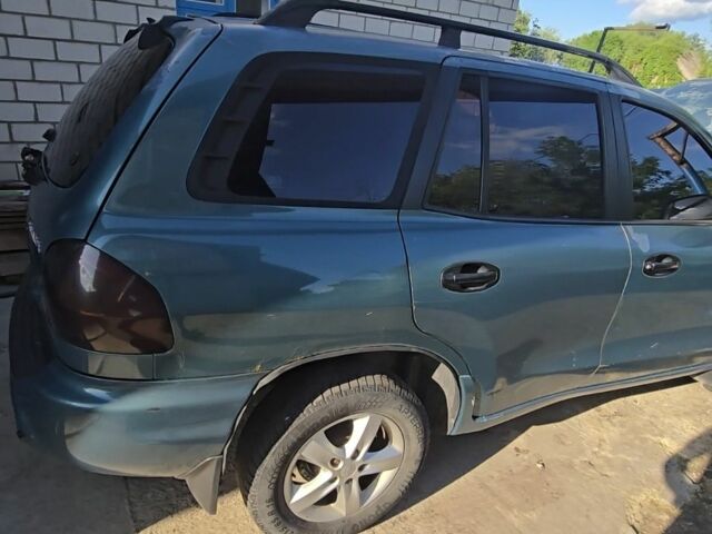 Зеленый Хендай Санта Фе, объемом двигателя 2 л и пробегом 350 тыс. км за 3349 $, фото 8 на Automoto.ua