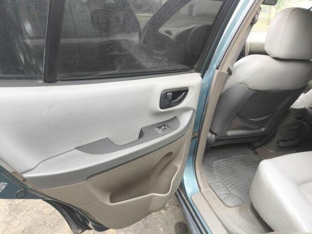 Зелений Хендай Санта Фе, об'ємом двигуна 2 л та пробігом 280 тис. км за 2222 $, фото 10 на Automoto.ua