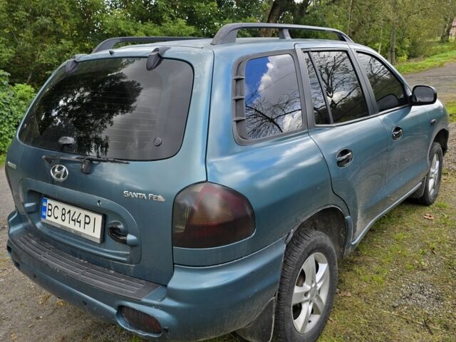 Зеленый Хендай Санта Фе, объемом двигателя 2 л и пробегом 350 тыс. км за 3349 $, фото 9 на Automoto.ua