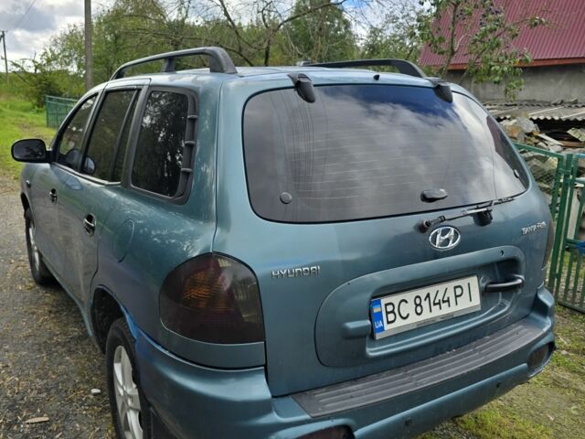 Зеленый Хендай Санта Фе, объемом двигателя 2 л и пробегом 350 тыс. км за 3349 $, фото 10 на Automoto.ua