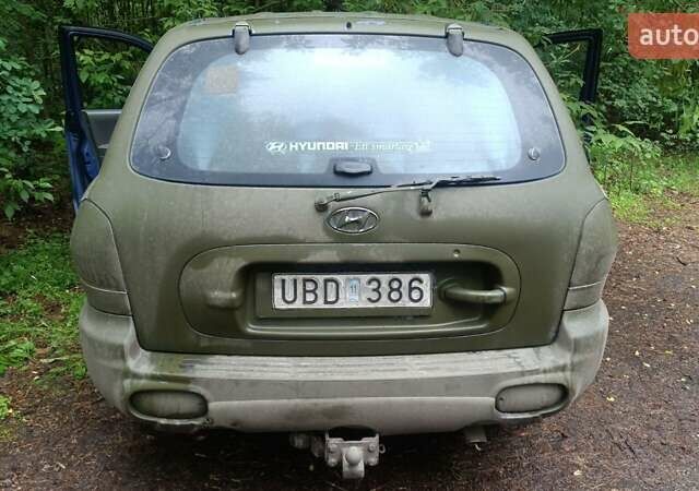 Зеленый Хендай Санта Фе, объемом двигателя 2.4 л и пробегом 225 тыс. км за 3000 $, фото 1 на Automoto.ua