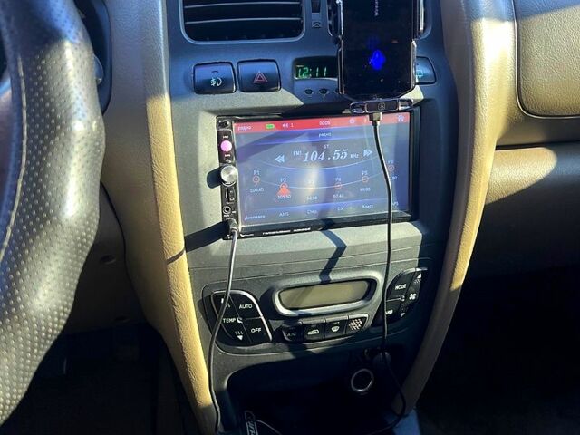 Зелений Хендай Санта Фе, об'ємом двигуна 2 л та пробігом 388 тис. км за 4500 $, фото 8 на Automoto.ua