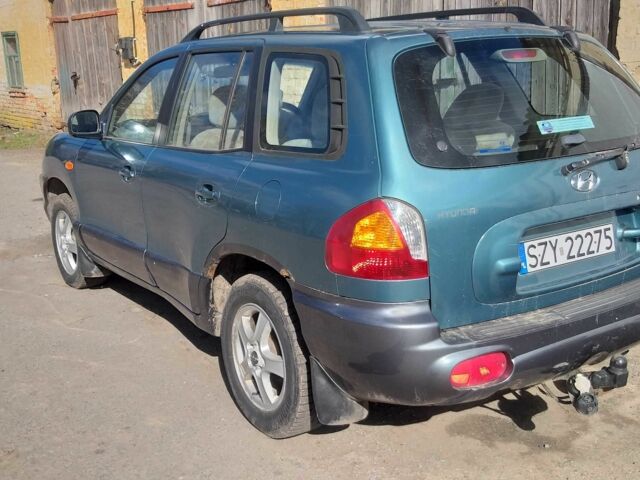 Зеленый Хендай Санта Фе, объемом двигателя 2 л и пробегом 125 тыс. км за 2999 $, фото 5 на Automoto.ua