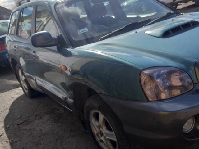 Зеленый Хендай Санта Фе, объемом двигателя 2 л и пробегом 125 тыс. км за 2999 $, фото 2 на Automoto.ua