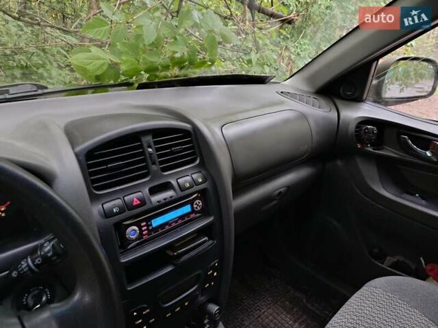 Зеленый Хендай Санта Фе, объемом двигателя 2.4 л и пробегом 225 тыс. км за 3000 $, фото 8 на Automoto.ua